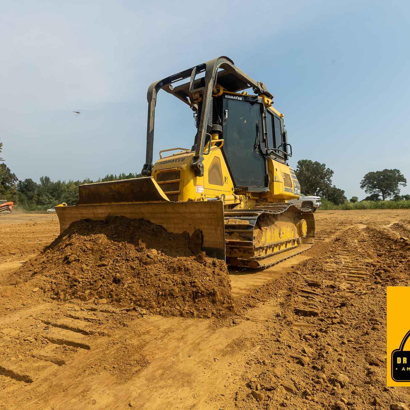 Heavy equipment on a cleared site